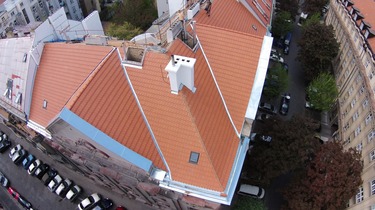 Kontrola rekonstrukce střechy činžovního domu