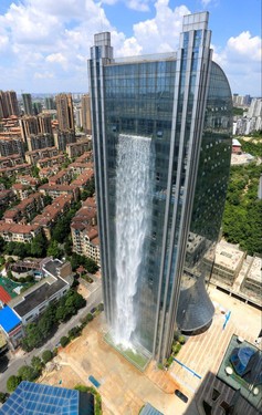 Liebian Building with 350ft waterfall on the side. Source: www.metro.co.uk
