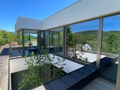 Hliníková okna WELL OKNA se skrytým větracím křídlem - nový standard moderní architektury